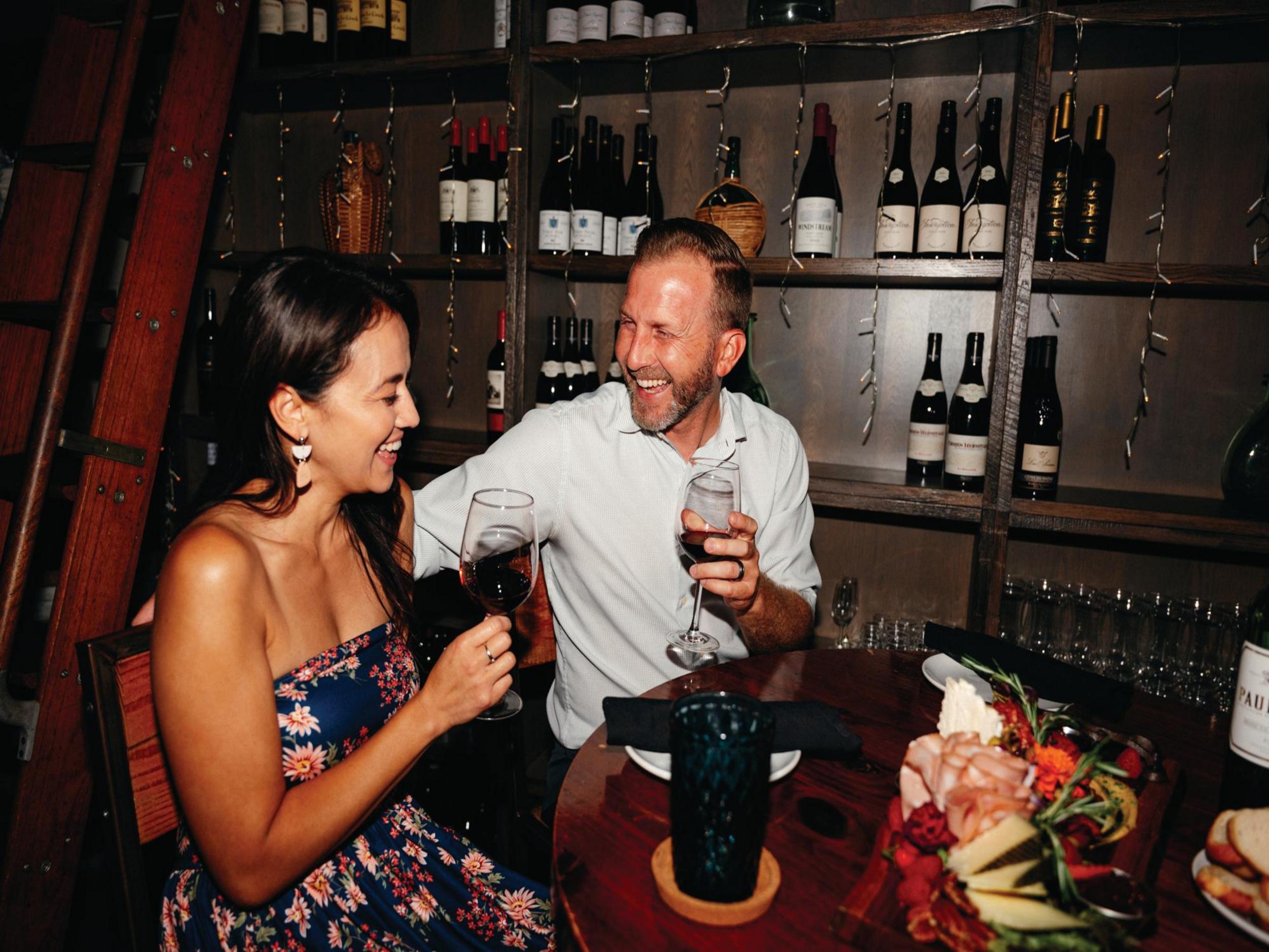 a couple out for dinner at Bacchus Wine Bistro