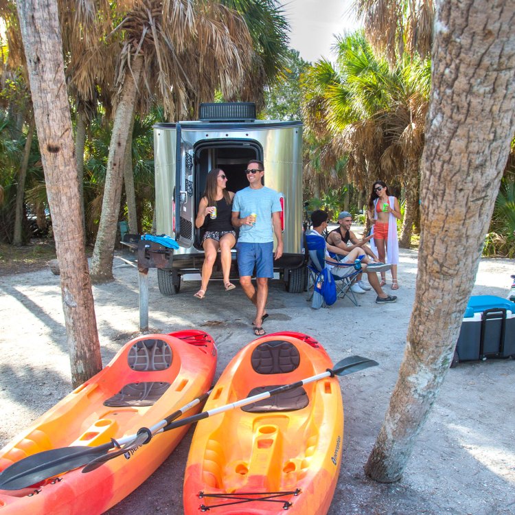 People camping in Fort de Soto Park with kayaks