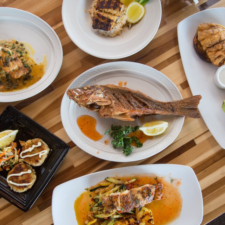 a fish plate and several other dishes