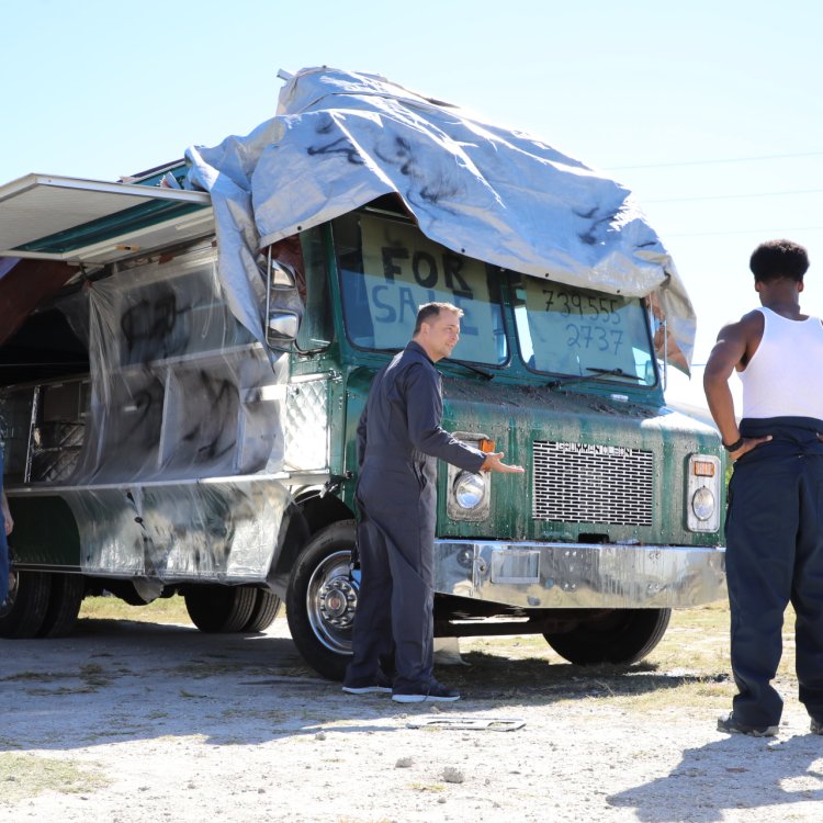 actors in a scene with a broken vehicle