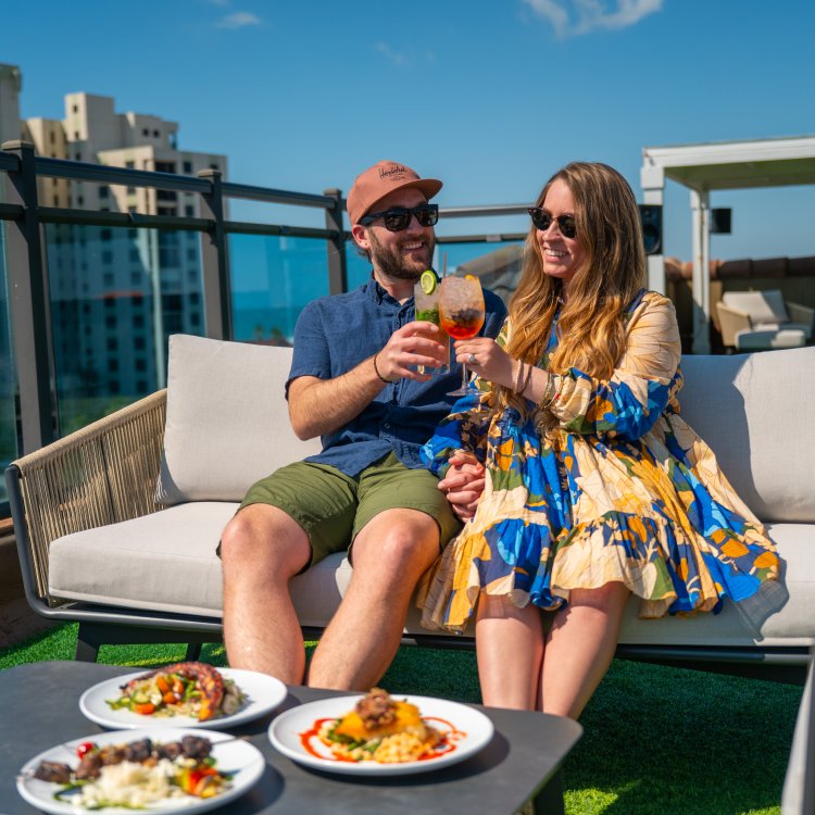 couple eating on rooftop