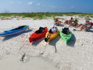 Kayakers taking a break in Caladesi Island.