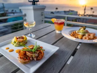 Rooftop dining during sunset at The Dewey