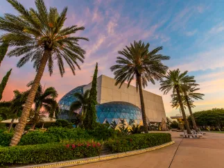 A view of the unique architecture of the Dali Museum at sunset.