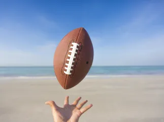A football thrown in the air