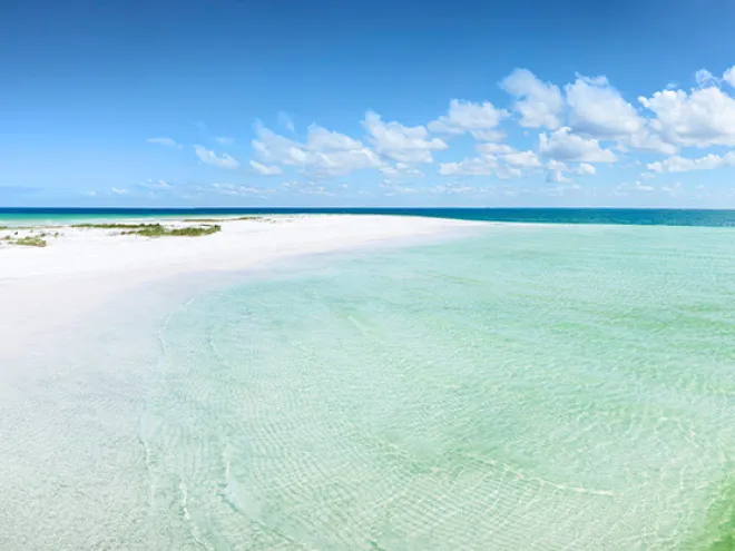 Anclote Key white sand and emerald-green water beach.