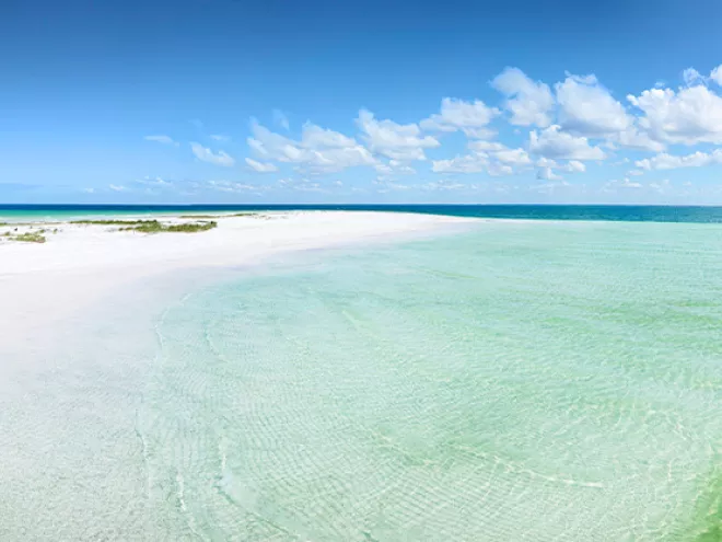 Anclote Key white sand and emerald-green water beach.