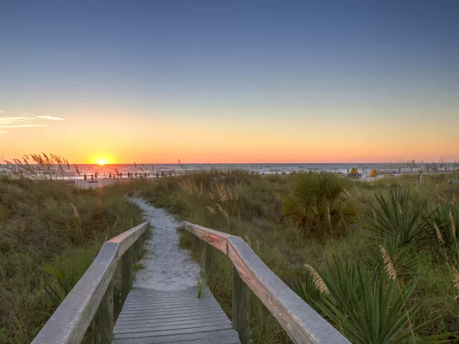 A walkway to Indian Rocks Beach at Sunset