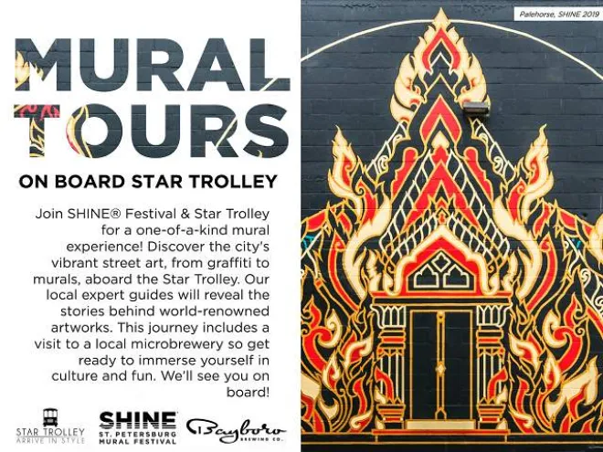 Mural Tours on board Star Trolley in St. Pete featuring an asian-inspired red, gold and black mural.