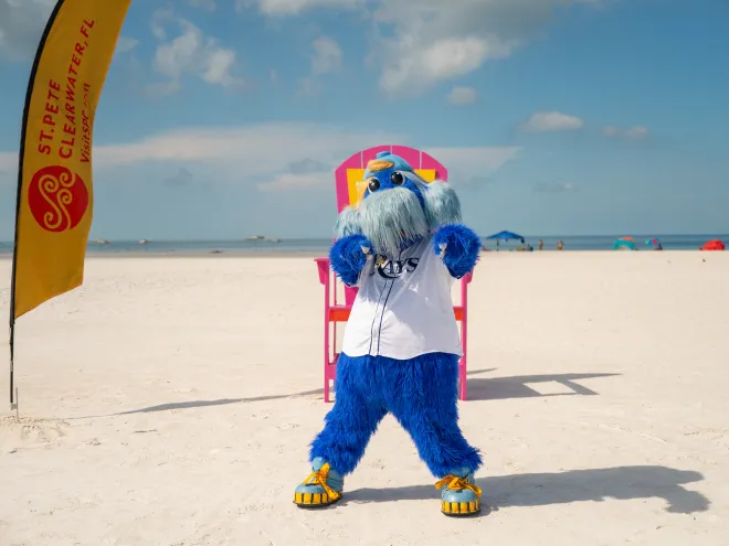 Raymond, the Tampa Bay Rays mascot, plays on the beach at Treasure Island