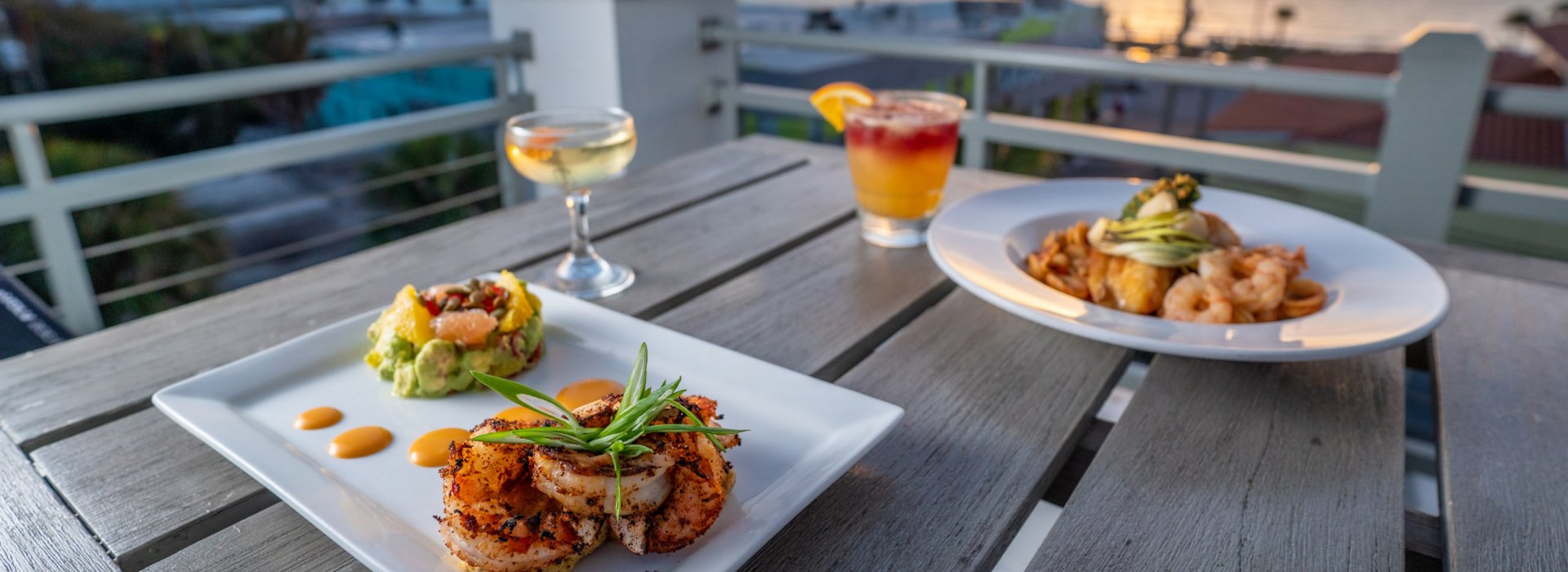 Rooftop dining during sunset at The Dewey