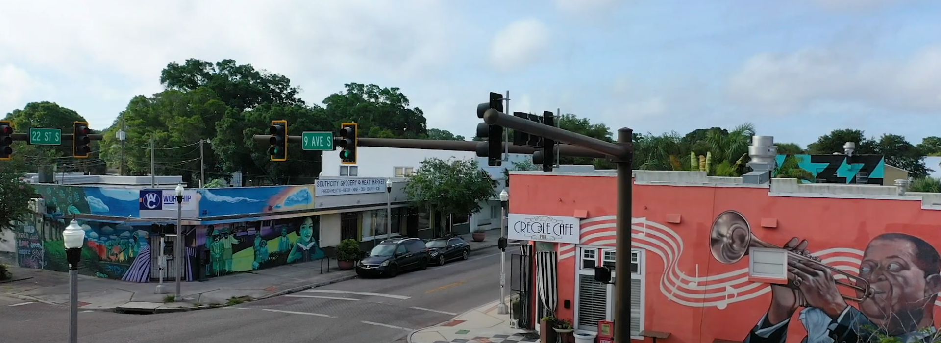 A drone shot of 22nd Street in the Dueces Live District