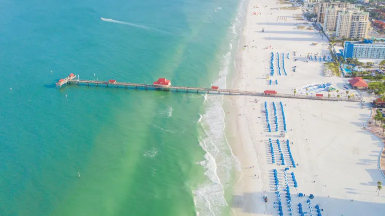 Aerial view of Pier 60 and blue cabanas in Clearwater Beach