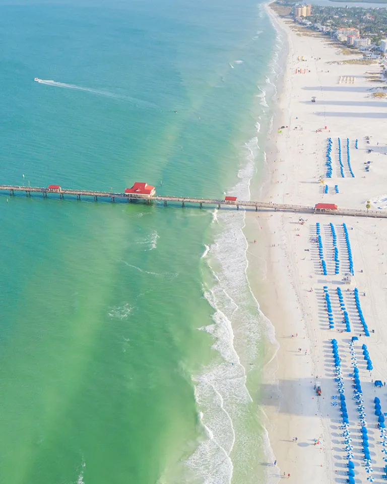 Aerial view of Pier 60 and blue cabanas in Clearwater Beach