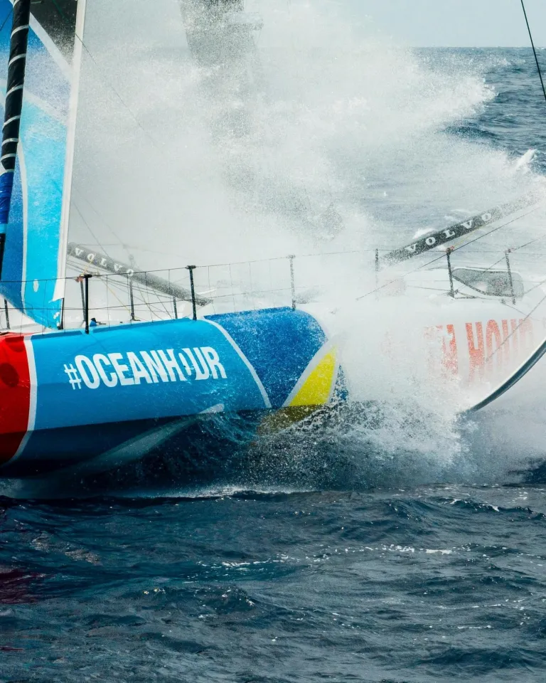 a sailboat splashes through the water during the Ocean Race, coming to St. Pete in May 2027