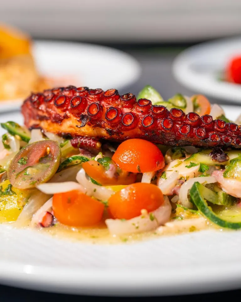 octopus served atop a salad at Azura Coastal Kitchen at the Hotel Zamora
