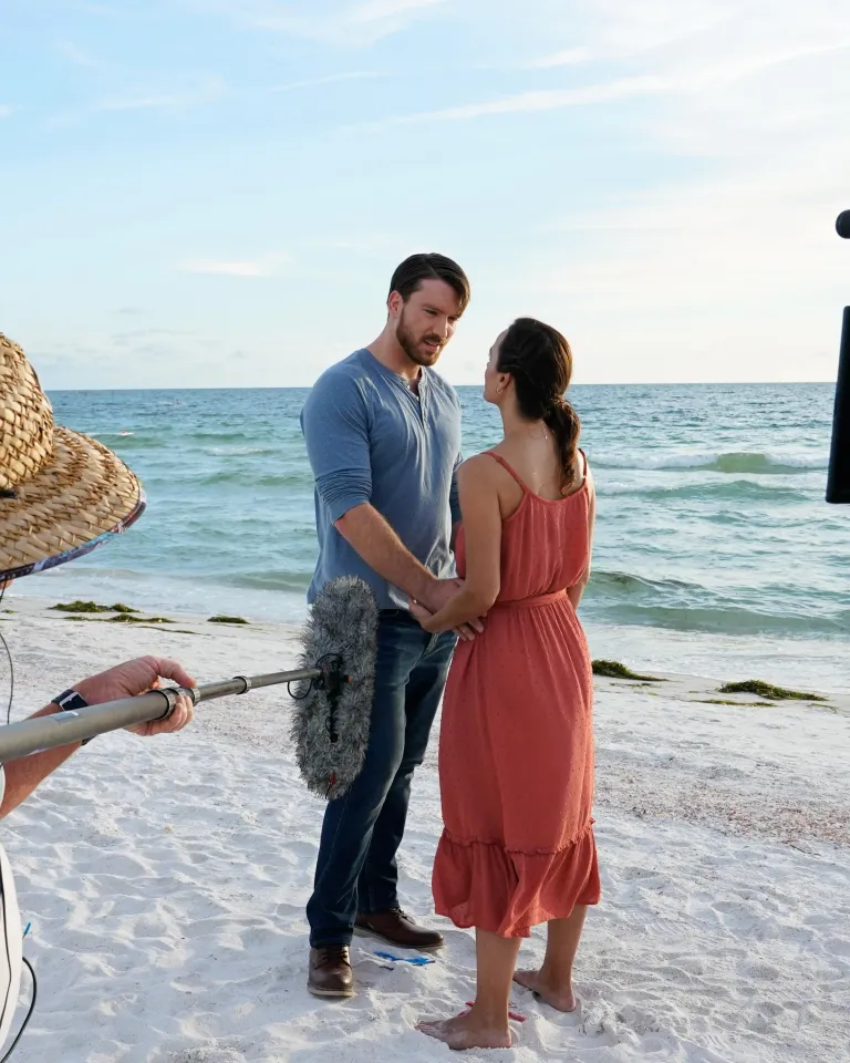 A beach scene behind the camera of Taste of Love