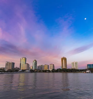 Blue and purple sunrise sky of St. Pete downtown skyline.