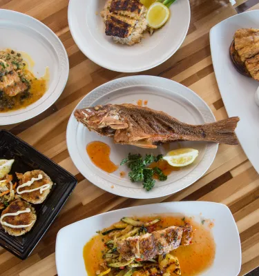 a fish plate and several other dishes