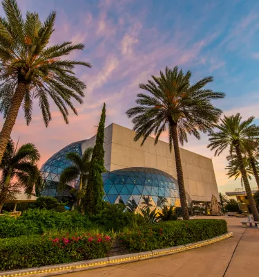 A view of the unique architecture of the Dali Museum at sunset.