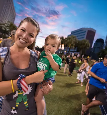 Mother and child tailgating at the Rowdies soccer game. 