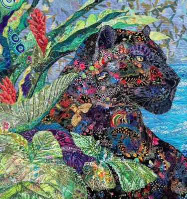 “Welcome Rain,” by Clearwater-based artist Lorraine Turner, is made from Tussah silk, banana fibers, merino wool, vintage doilies, lace, organza, dyed cheesecloth, cotton fabrics and threads, dyed silk embroidery floss, and beads. It is 24 x 25 inches.