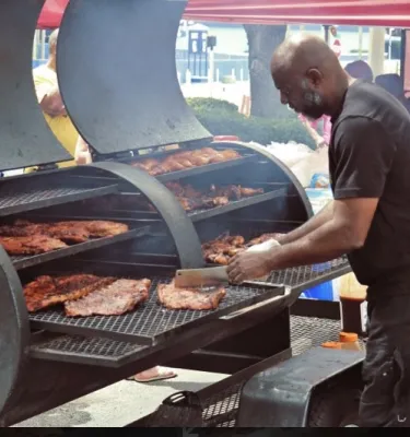Saturday Morning Shoppe vendor cooking bbq