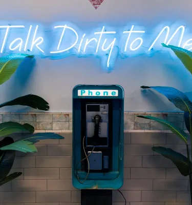 Image of the secret payphone entrance at Dirty Laundry in St. Pete to enter their special speakeasy lounge.