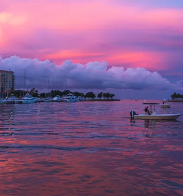 Several boats docked at Vinoy Park marina at sunset