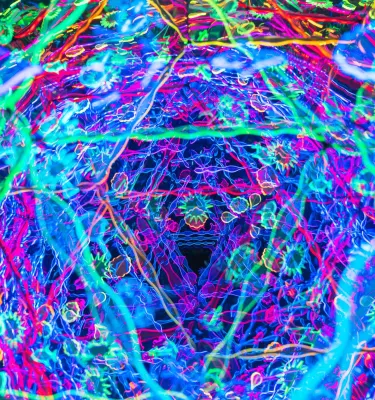 A neon blue red and purple kaleidoscope of colors at Fairgrounds St. Pete