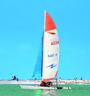 Catamaran sailing off Honeymoon Island