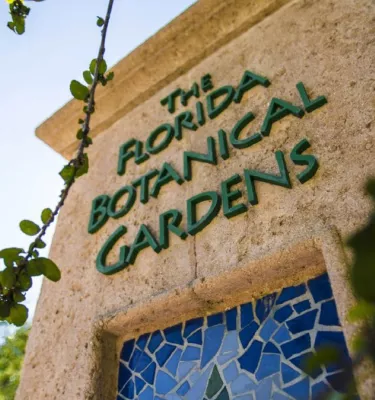 An image of the Florida Botanical Gardens entrance during the day.