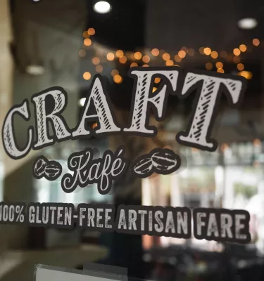 Sign for Craft Kafe painted on window
