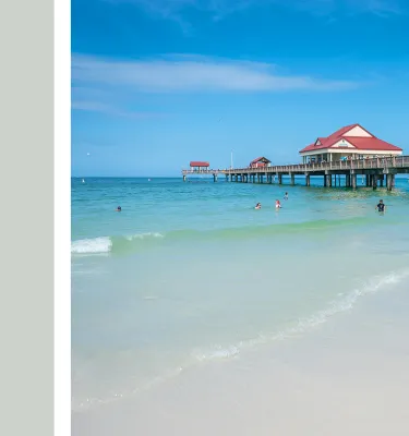 a light green box next to the photo of the beach showing the sand