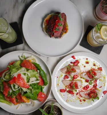 A variety of Mediterranean dishes are served.