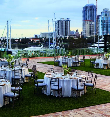Wedding reception tables by the bay