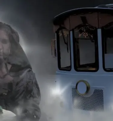 Ghostly Haunted Trolley Tour featuring a ghost figure wearing all black.