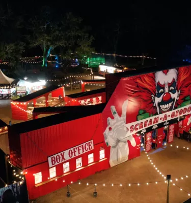 Scream-a-geddon horror park aerial view during the evening.