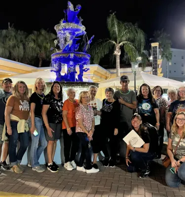 Group of 10+ people attending an evening haunted city tour.