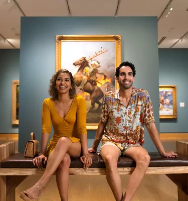 Two people sit at the James Museum