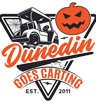 Dunedin Goes Carting halloween event featuring a golf cart and an orange jack-o-lantern. 