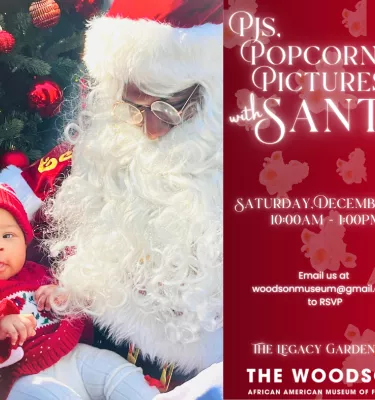 Santa with a baby on his lap.