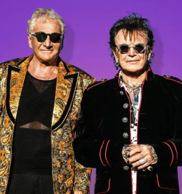 Air Supply band featuring two men.