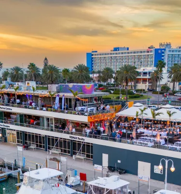 Aerial view of the rooftop Bar Tiki Market during sunset.
