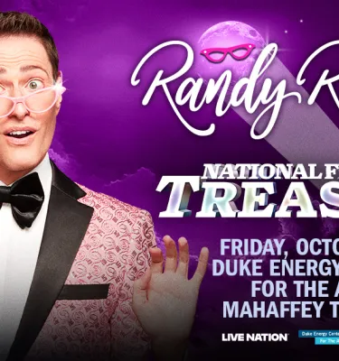 Randy Rainbow in a pink suit on tour.