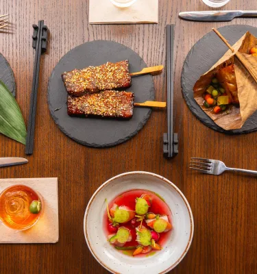 four beautifully prepared Pan Asian plates of food at Fortu in St. Pete