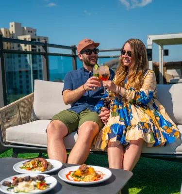 couple eating on rooftop