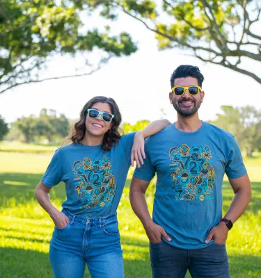 two people standing with sunglasses on