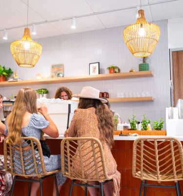 woman sitting at coffee bar 