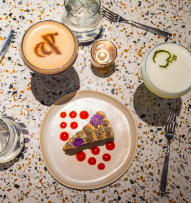 plates of food and cocktails
